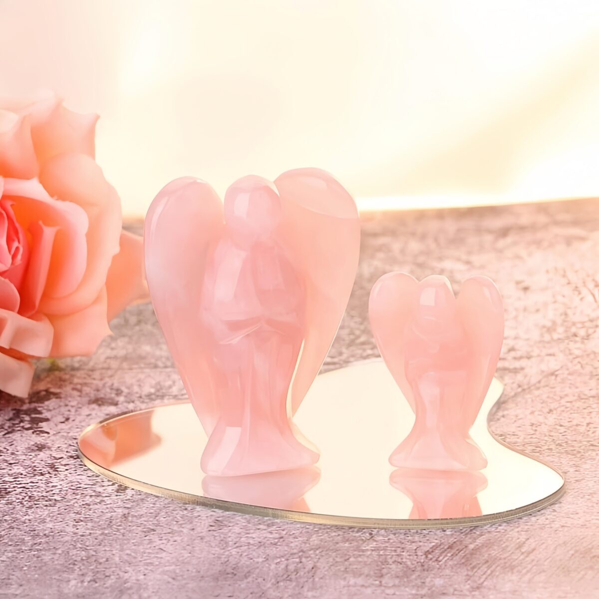 Handmade stone carvings of pink crystal angels - Image 5